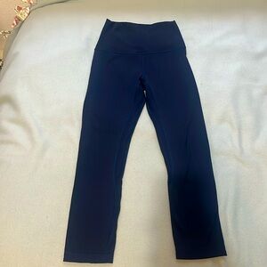 Navy blue align legging,size 2,lightly worn good condition,I believe they’re 25”